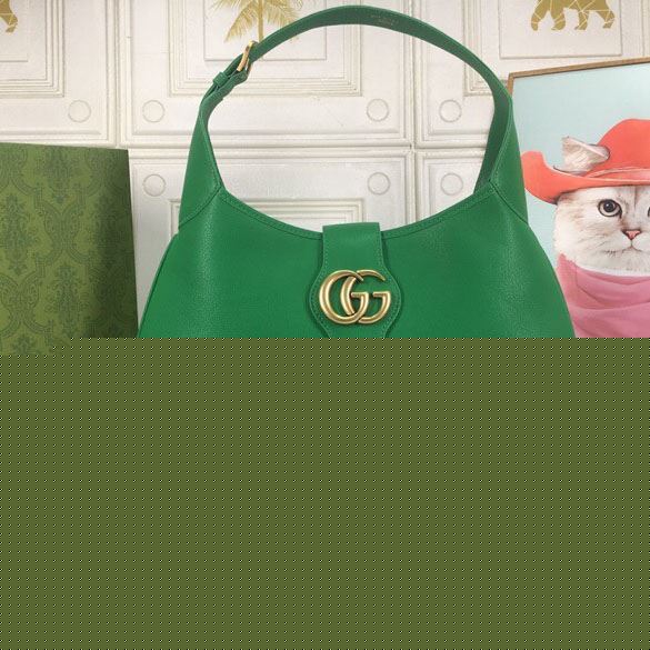 G*u*i top handle bags